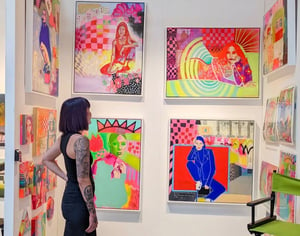 Woman looking at art